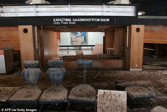 Bird droppings cover seats in the departure lounge inside the old Nicosia airport terminal building