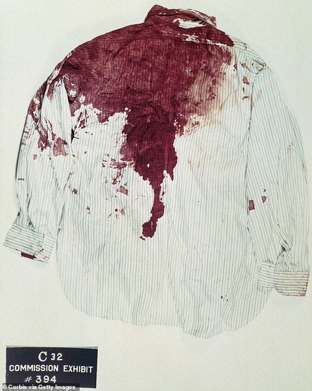 The shirt worn by John F. Kennedy on the day he was assassinated is seen covered in blood