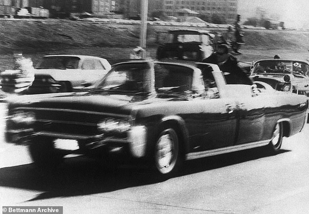 The limousine with Kennedy and Governor Connally, both of whom were struck with gunfire, speeds off to Parkland Memorial Hospital