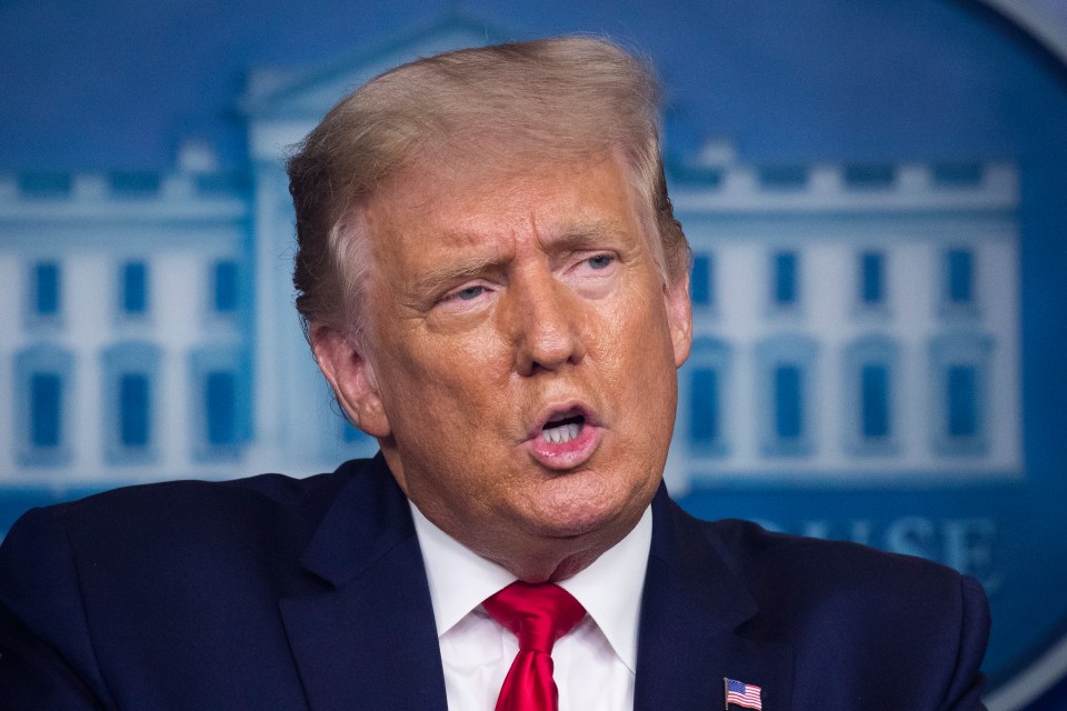 Donald Trump speaking at a news briefing in the James Brady Press Briefing Room.