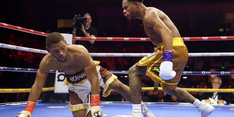 Devin Haney BEATS Brian Norman on points to win WBO welterweight title and taunts rival after scoring knockdown