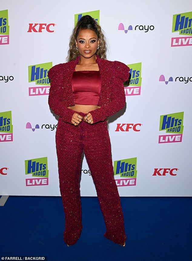 Fleur, 38, got into the festive spirit in a sparkly red co-ord and satin crop top