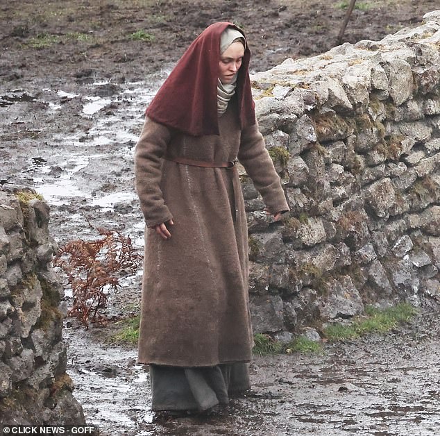 Lily-Rose trudges through the mud of the Surrey set of Werwulf, directed by Robert Eggers