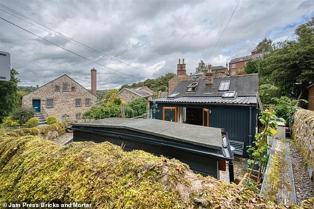 Brand new wood burner, modern living in a stone-built home, easy-maintenance courtyard garden with summer house