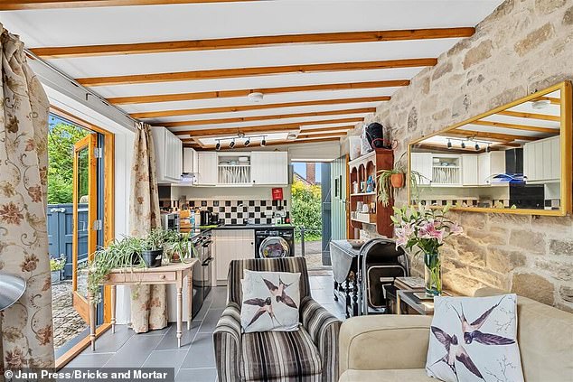 The listing describes it as a 'stylish detached home with bedroom and additional mezzanine, two off-road parking spaces to the front