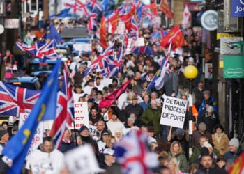 Hundreds protest against plans to house 600 migrants in army camp as young cadets face being forced out