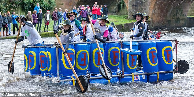 The Royal National Lifeboat Institute's (RNLI) charity raft race could be axed this year after marshals revolted over 'verbal abuse' from spectators (Pictured: The Matlock Boxing Day Raft Race 2016)