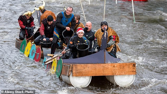 Organisers have warned the race could be shut down forever if people continue to throw food (Pictured: The Matlock Boxing Day Raft Race 2016)
