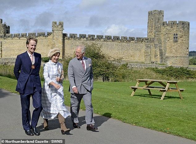 The current 12th Duke, Ralph Percy, 69, is worth £517million, according to the Sunday Times Rich List. He is pictured with his wife and King Charles