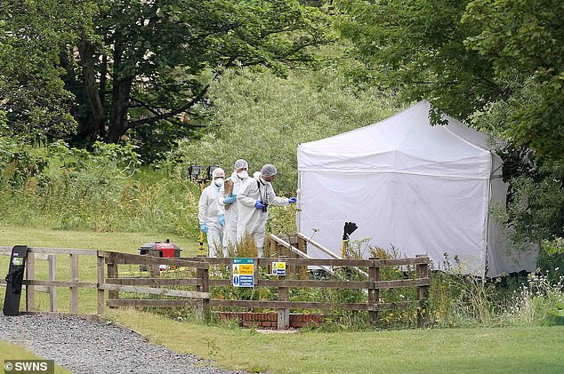Forensic officers comb the scene where fugitive Raoul Moat shot himself in 2010