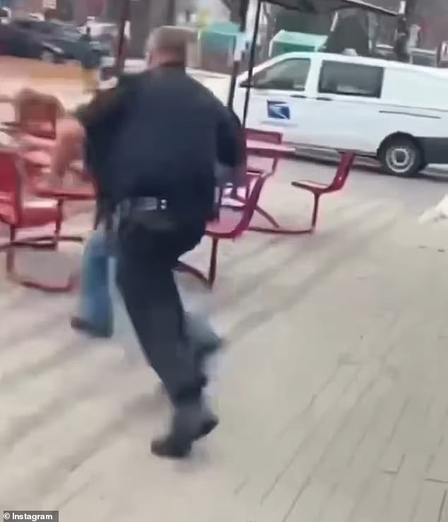 Ramos is seen being chased down by the white male police after she allegedly hurled the drink at him