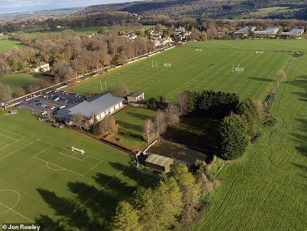 Plans were initially in place to transform an empty sports club (pictured in middle with car park) on the land into an indoor climbing centre, but they were shelved