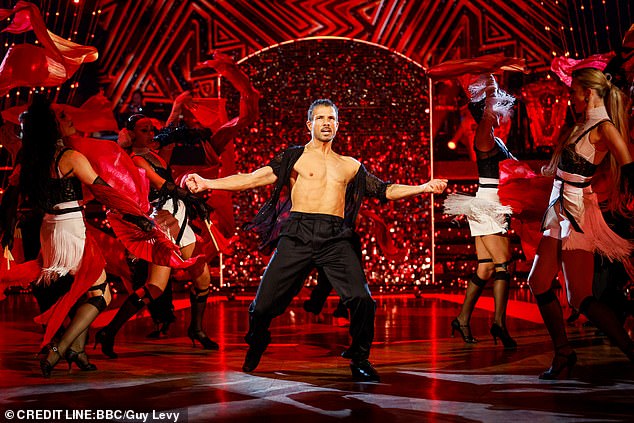 Fans were distracted by Danny's ripped physique as he danced his famous Samba in an undone sheer shirt, and said he was 'robbed' of the Glitterball