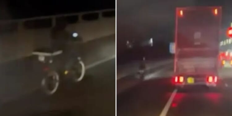Watch moment delivery driver rides e-scooter down busy motorway as lorry spotted overtaking 'idiot' biker