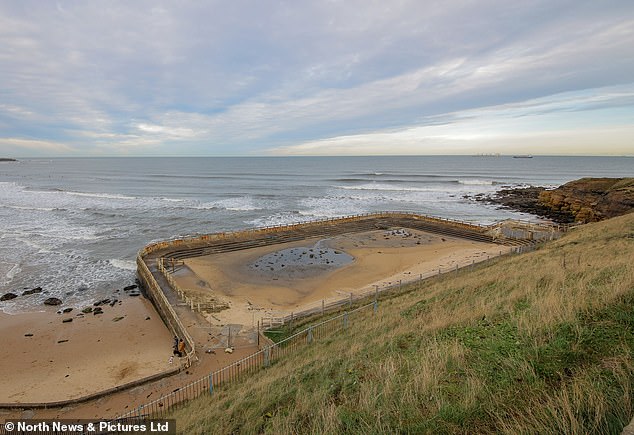 The once elegant art deco swimming pool, built in the 1920s, is a shell of its former self - a hulk of wind battered stone and metal, crumbling into the North Sea, on the edge of Longsands Beach