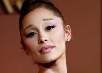 Prankster who lunged at singer Ariana Grande has been kicked out of Singapore and banned from returning