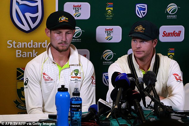 Smith (right) and Cameron Bancroft (left) were rubbed out of playing Test cricket for a year and nine months respectively