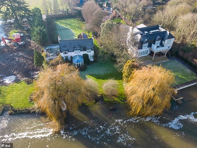 Ricky's current home on the banks of the Thames. The comedian will have to gain a special flood permit and has been advised to sign up to a helpline if his plans are approved to demolish a £6M home in Marlow and replace it with a swanky mansion