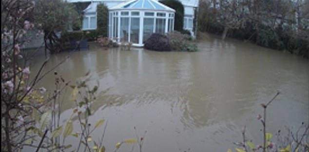 He ncluded CCTV pictures in his original planning application that showed flooding around the main entrance of his riverside home, together with the garage and back garden