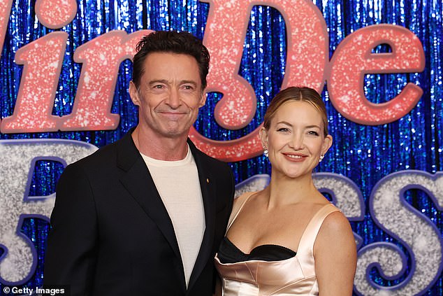 Kate flashed a radiant smile as she posed for the cameras, before cosying up to her co-star Hugh, 57, who plays her onscreen husband in the film