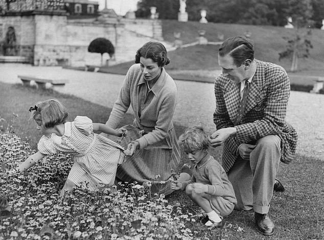 Lord and Lady Powerscourt, and their children in the gardens of Powerscourt House