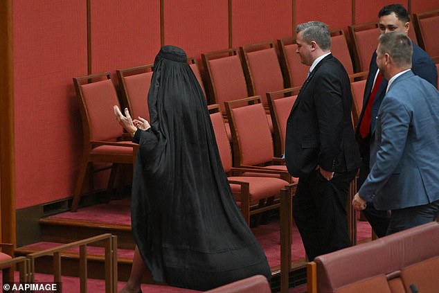 Pauline Hanson has been suspended from the Senate, after wearing a burqa in the chamber