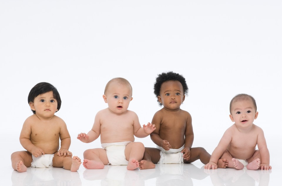 Multi Ethnic Babies Sitting on White.