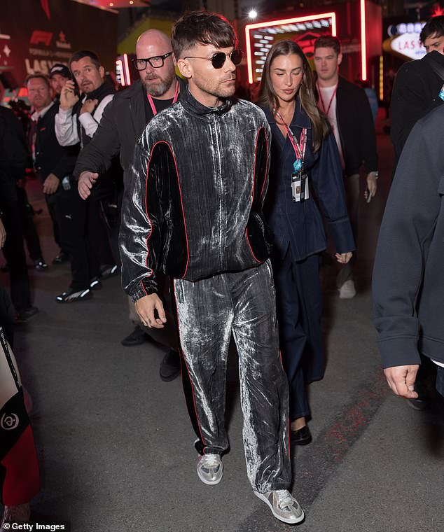 the foTmer One Direction star was hand-in-hand with girlfriend Zara as they mingled with guests at the event, held annually in Paradise, Nevada