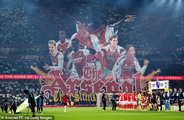 Sol Campbell arms outstretched was a standout feature of Arsenal's tifo against Tottenham