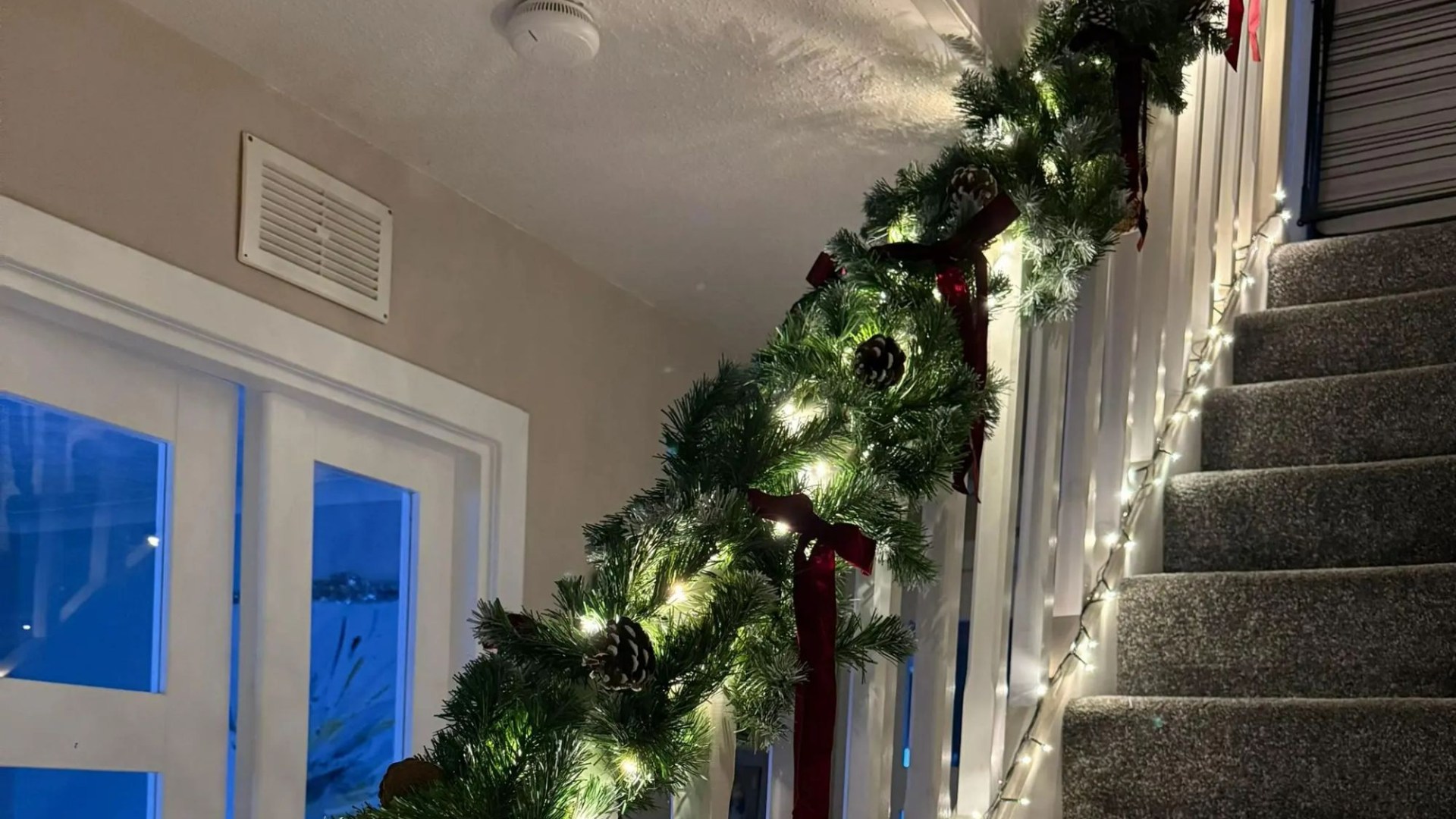 I DIY’ed the best Christmas staircase garland using a £10 B&Q buy and Home Bargains bows