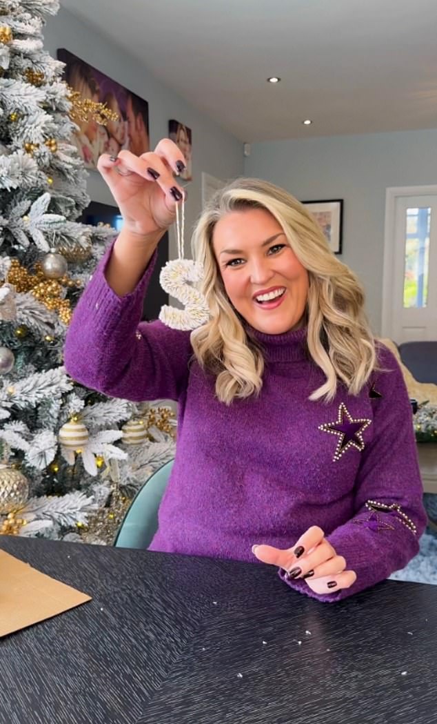 While Dragons' Den star Sara Davies has filmed herself doing Christmas crafts