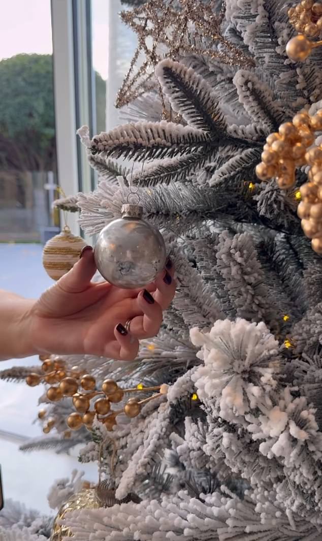 The Dragons' Den star already has her tree up and has decorated it with mercury glass baubles and cardboard initials