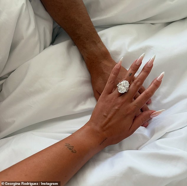 That said, he did buy her a £1.5million ring, which she revealed in August announcing the news