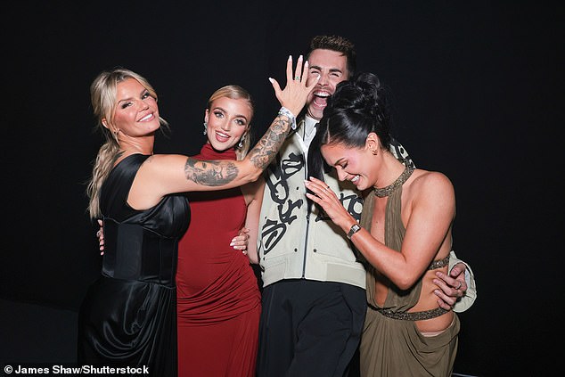 After presenting awards, Kerry, Princess, Joe and Olivia posed for photos