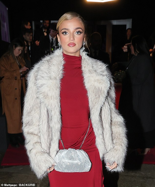 The ITV star toted her belongings in a sequin handbag