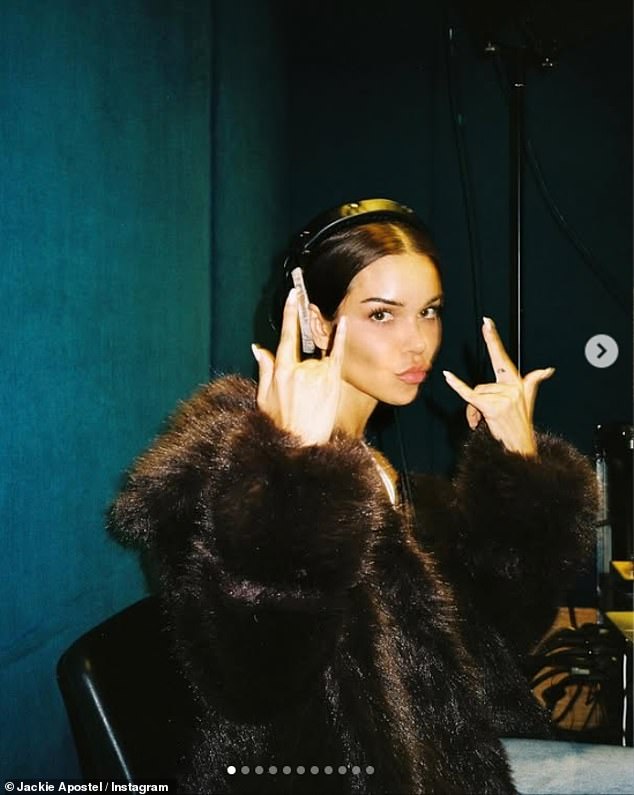 Other photos included Jackie making music in the studio