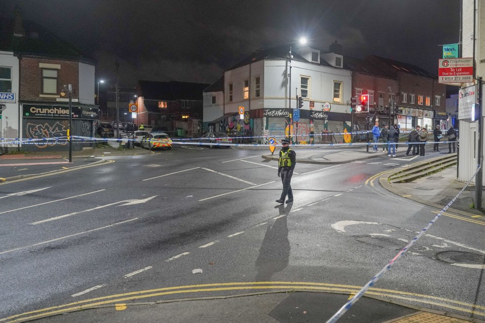 Police cordoned off London Road near Abbeydale Road in Sheffield at night.