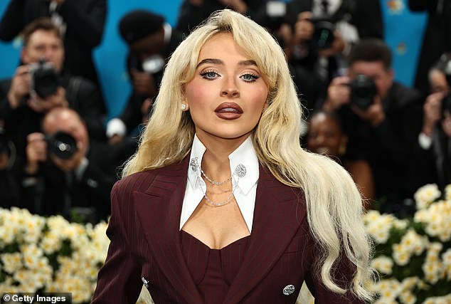 Fans of the American pop star, 26, dubbed her rebranding as 'wild' as she has emerged with signature bangs, platinum blonde hair and a new sense of style (pictured in May at the Met Gala)