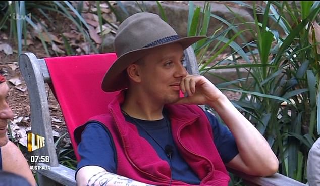 One fan asked: 'Is that a bite on Aitch's neck?' (pictured)