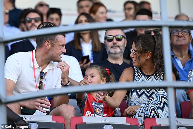 The home that he shares with wife Rebekah (pictured, right) was broken into by a gang of three men while he was in Rome playing in his side's 3-1 defeat