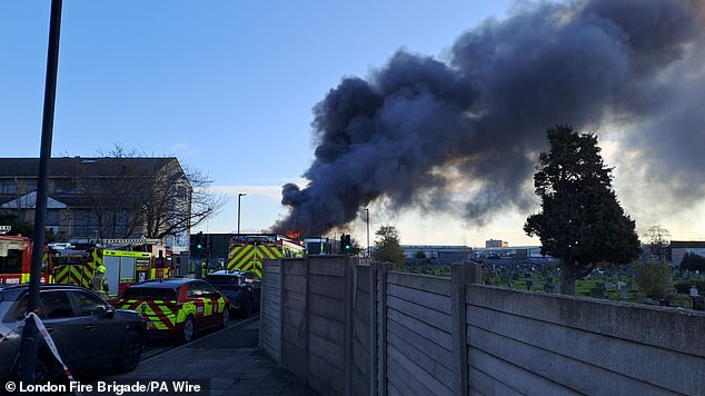 Around three-quarters of the structure was alight earlier, but it is now understood the entire building is 'fully alight, internally and externally'