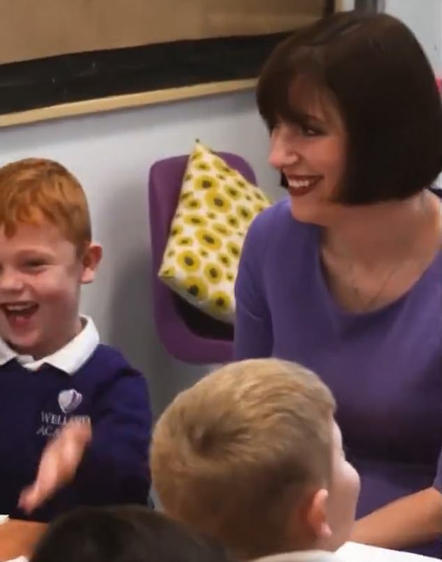 Education Secretary Bridget Phillipson sat in her chair smiling but did not join in with the meme