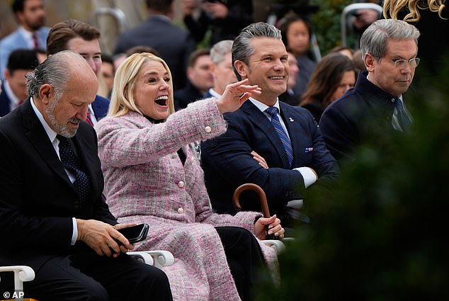 From left, Commerce Secretary Howard Lutnick, Attorney General Pam Bondi, Defense Secretary Pete Hegseth and Treasury Secretary Scott Bessent attend Trump's turkey pardon