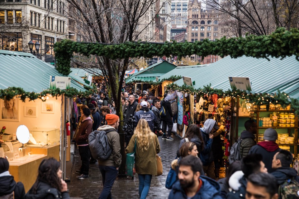 People visiting Christmas Market stands in Union Square in Midtown Manhattan.