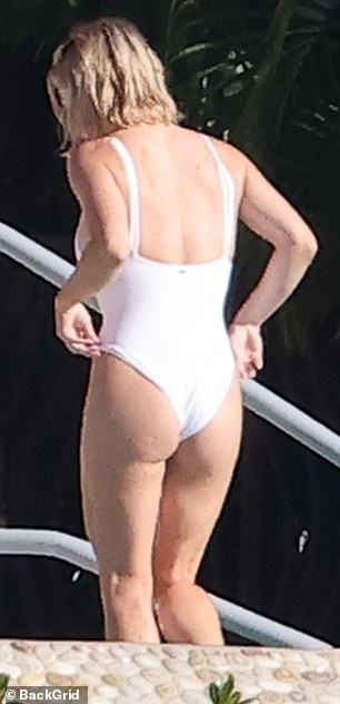 The star stood by the edge of the pool