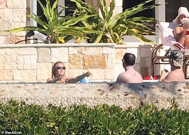 The group appeared to be tossing about a ball