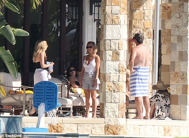 The star caught up with her pals on the pool deck