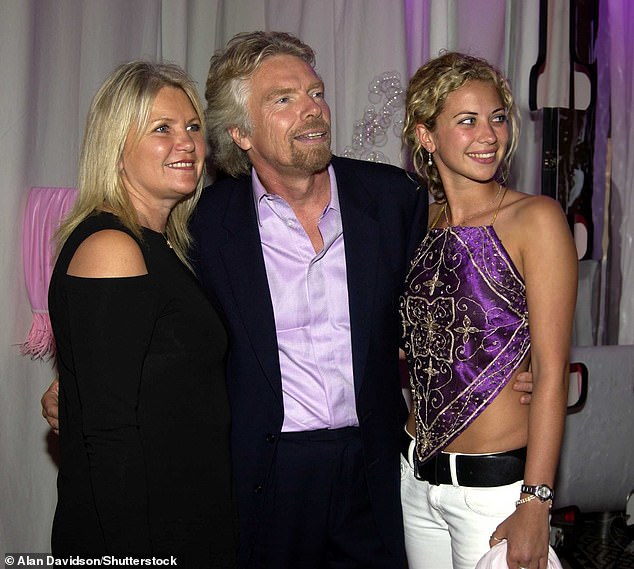 Sir Richard pictured with Lady Joan and their daughter Holly in 2003