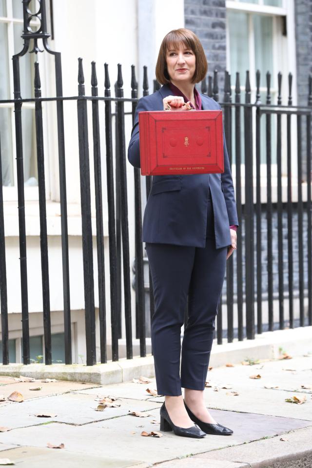Rachel Reeves, UK Chancellor of the Exchequer, outside 11 Downing Street holding a red budget box.
