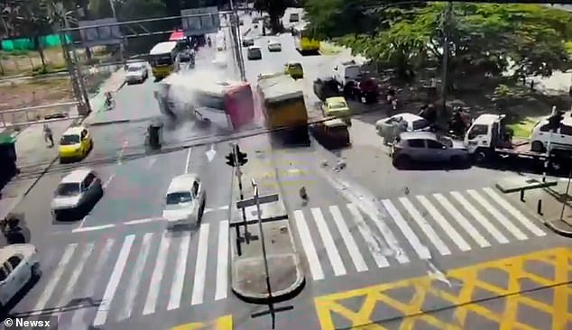 The runaway giant appeared to make no attempt to stop before ploughing straight into the back of a packed line of vehicles, shunting them aside like small toys